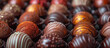 Various chocolate candies, praline, truffle. Sweet food, dessert. Confectionery background.	
