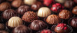 Various chocolate candies, praline, truffle. Sweet food, dessert. Confectionery background.	
