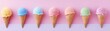 Multi-colored cones ice cream balls on a blue background, top view, banner.