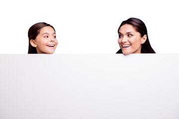 Canvas Print - Close up photo beautiful two people brown haired mom little daughter amazing look at each other signboard poster gladly open mouth laugh laughter wearing t-shirts isolated bright blue background