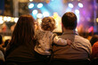 Family Enjoying Live Music Concert Together at Night