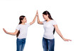 Close up photo pretty two people brown haired mum small little daughter clapping arms self-confidently stand win winner family games victory wear t-shirts isolated bright blue background