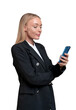 © ImageFlow - A businesswoman in a black suit holding a smartphone against a white background, portraying communication or technology