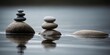 A stack of rocks sitting on top of a body of water