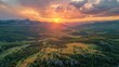 © Валерія Ігнатенко - Aerial view of sunset over valley with mountain backdrop