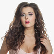 © millaf (Nemchinova) - Happy fashion model with perfect clear skin, long curly hairstyle and make-up on white background. Fashion, beauty, cosmetology, hair care and skin care concept