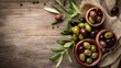 Olives on wooden background