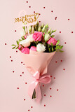 Fototapeta Mapy - Bouquet of flowers and confetti on pink background. Happy Mothers Day concept.
