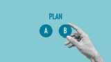 The choosing of business plan b out of two options on blue background. Proceed to plan B. Use a second chance