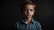 handsome kid boy looking at camera serious on dark plain black background from Generative AI