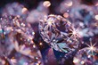 Scintillating diamonds suspended in midair with sparkling light reflections and bokeh