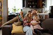 © BGStock72 - Cozy family bonding moment in a warm living room