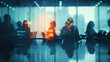 © BritCats Studio - Unfocused silhouettes of office workers during a strategic meeting  encapsulated behind a glass wall  illustrating corporate anonymity