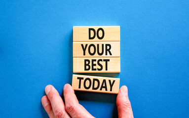Wall Mural - Do your best today symbol. Concept words Do your best today on beautiful wooden block. Beautiful blue table background. Businessman hand. Business motivational do your best today concept. Copy space