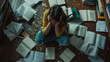 © John - Young female College student frustrated and stressed out while studying.