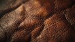 Detailed view of a brown leather surface, suitable for backgrounds and textures