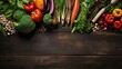 Top view and flat lay of fresh vegetables and fruits Healthy Raw vegetables scattered on rustic wooden table surface.