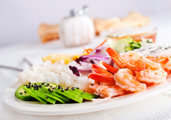 Poster - boiled rice with avocado and fried shrimps