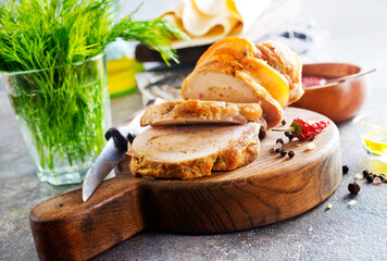 Poster - baked meat roll with spice on wooden board