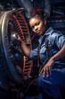 Confident female mechanic working on an airplane engine Generative AI image