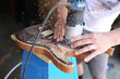 Close Up on Hands of Luthier Building a Wood Handmade Guitar