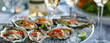 fresh oysters near champagne glasses
