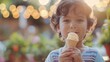 Happy cute little Latino boy eating an ice cream on sunshine beach with large copy space, concept of delight in summer vacation, travel, sweet summer time.