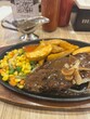 © yohanes - beef steak with mushroom sauce and potatoes