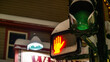 Close up of a traffic light at night displaying red. Do not cross, wait for the green light concept.