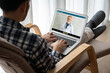 © Summit Art Creations - Doctor video call online by modish telemedicine software application for virtual meeting with patient