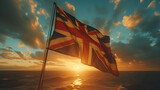 Fototapeta  - Flying Union Jack - uk - British flag - golden hour - sundown - yacht 