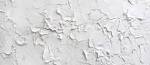 Close-up View Of White Paint Peeling Off A Wall Revealing The Surface Underneath In A Deteriorating State
