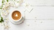 Serene white wooden background enhancing the simplicity of coffee and note paper