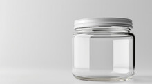 Empty Clear Glass Jar With A White Metal Lid On A Light Grey Background, Minimalistic Storage Concept.