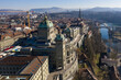 Bern, Switzerland: Aerial view of the Parliament building, the Bundeshaus in German, along the Aar river in early morning on sunny winter day.