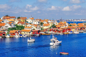 Canvas Print - Old fishing village with boats on the swedish west coast a beautiful summer day