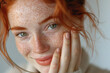 Smiling red hair woman with freckles close up