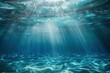 an underwater view of a blue ocean with sunlight streaming through the water