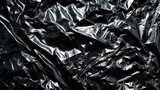 Fototapeta Przestrzenne - Detailed view of black foil sheet, suitable for various design projects