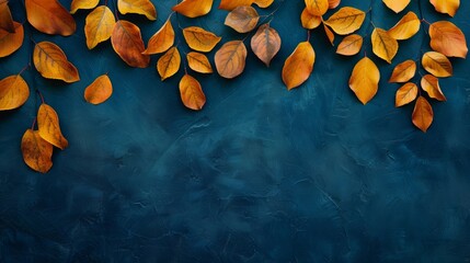 Canvas Print - Fallen autumn leaves scattered on a textured dark blue background.