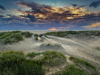 Wall Mural - Sunset on the beach of the north sea island Romo in Denmark.