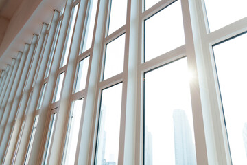 Canvas Print - A row of narrow windows in modern building