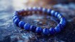 Detailed shot of a bracelet with blue beads, suitable for jewelry design projects