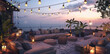 A modern rooftop terrace with comfortable outdoor seating, surrounded by lanterns and string lights, overlooking the ocean at dusk.