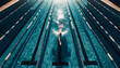 An overhead shot of a single swimmer in the middle of a swim lane in an outdoor pool.