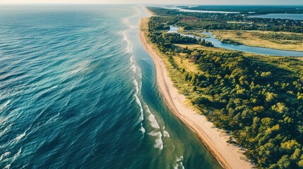 Aerial view of the Baltic Sea shore line near Klaipeda city, Lithuania. Beautiful sea coast on sunny summer day.