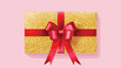 Greeting card with yellow glitter bow and red ribbon