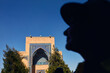 Woman looking at Gur Emir Mausoleum in Samarkand