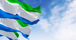 Three Sierra Leone national flags waving in the wind