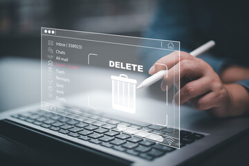The programmer's hand is tapping on the file icon under the concept of data deletion. The concept  technology and document management.data deletion and removal